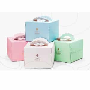 four custom cupcake boxes in different colors